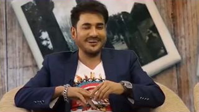 smiling man sitting