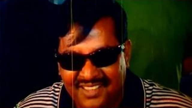 sunglasses guy laughs